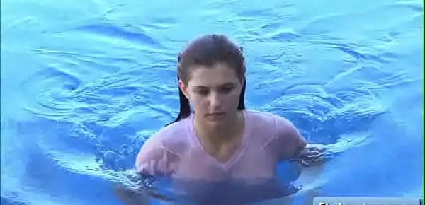 Lovely sexy teen amateur Fiona takes a swim in her pool and massage her natural wet big boobs
